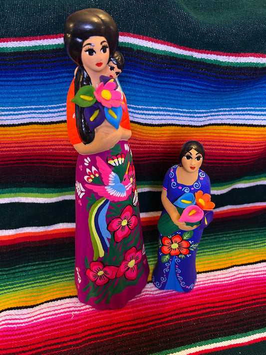 Hand painted Mexican folk art woman with child.