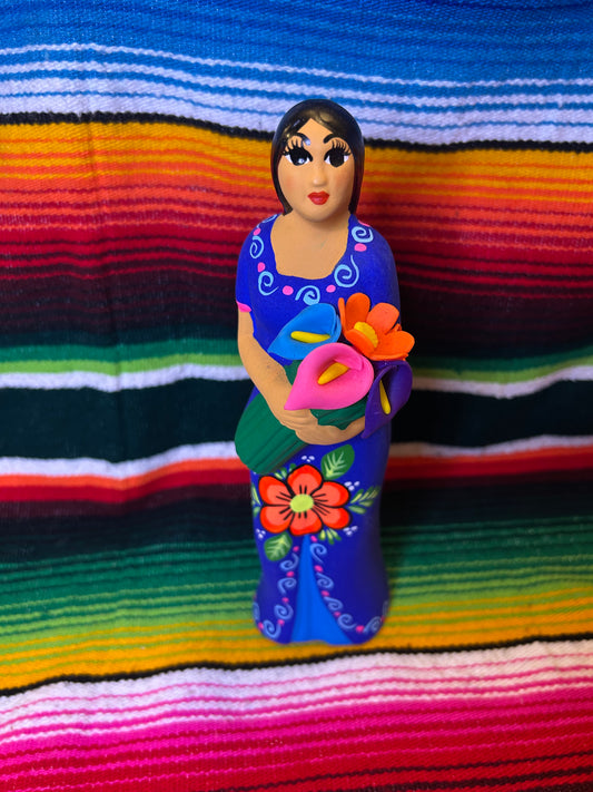 Hand painted Mexican folk art woman with child.